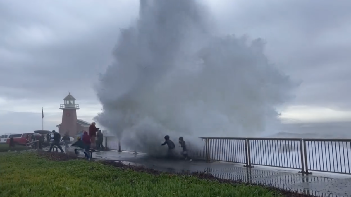 The video shows a giant wave injuring eight people in California