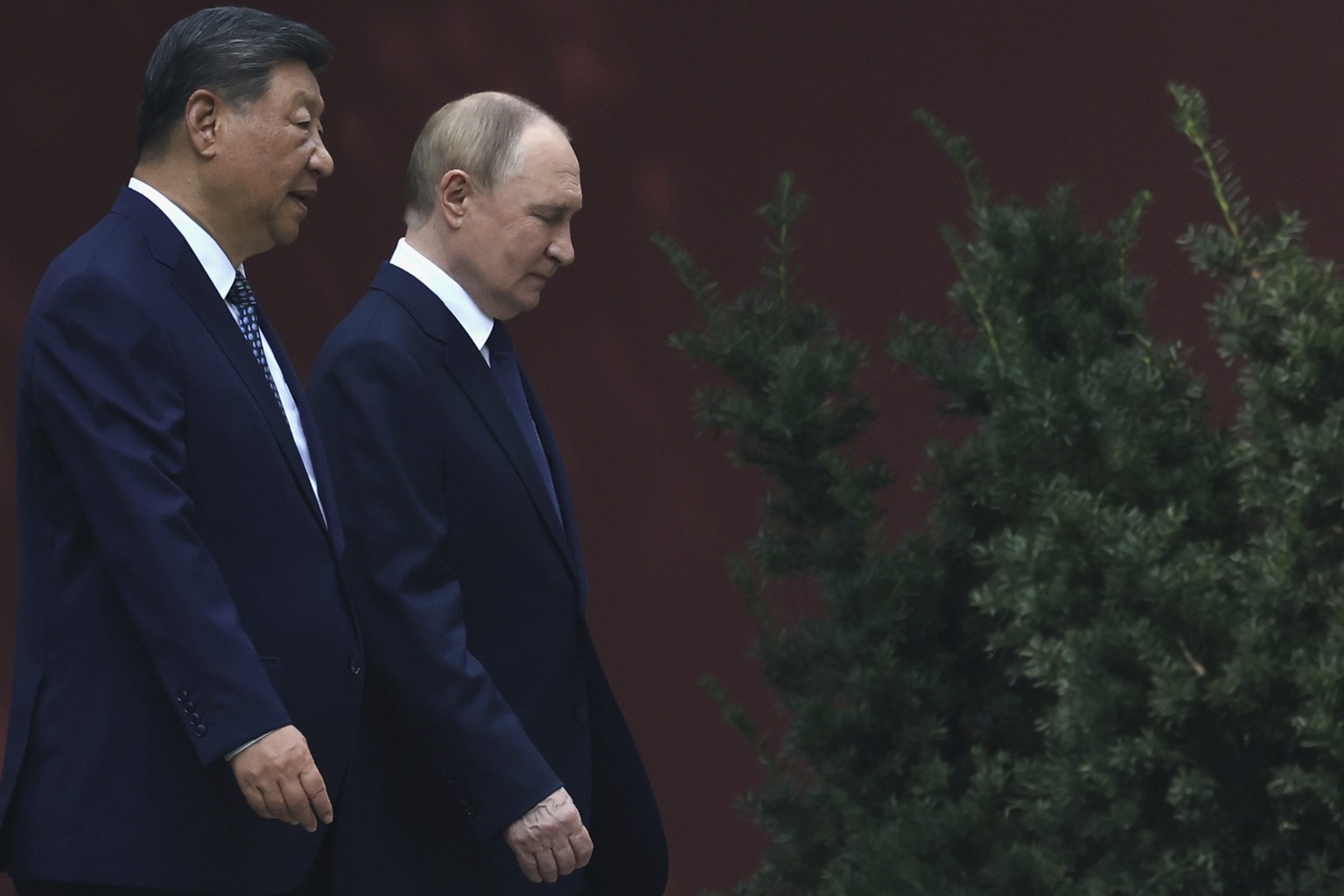 KEYPIX - Russian President Vladimir Putin, right, speaks with Chinese President Xi Jinping during a walk at the Zhongnanhai leadership compound in Beijing, China, Tuesday, Sept. 2, 2025. (Alexander Ka ...
