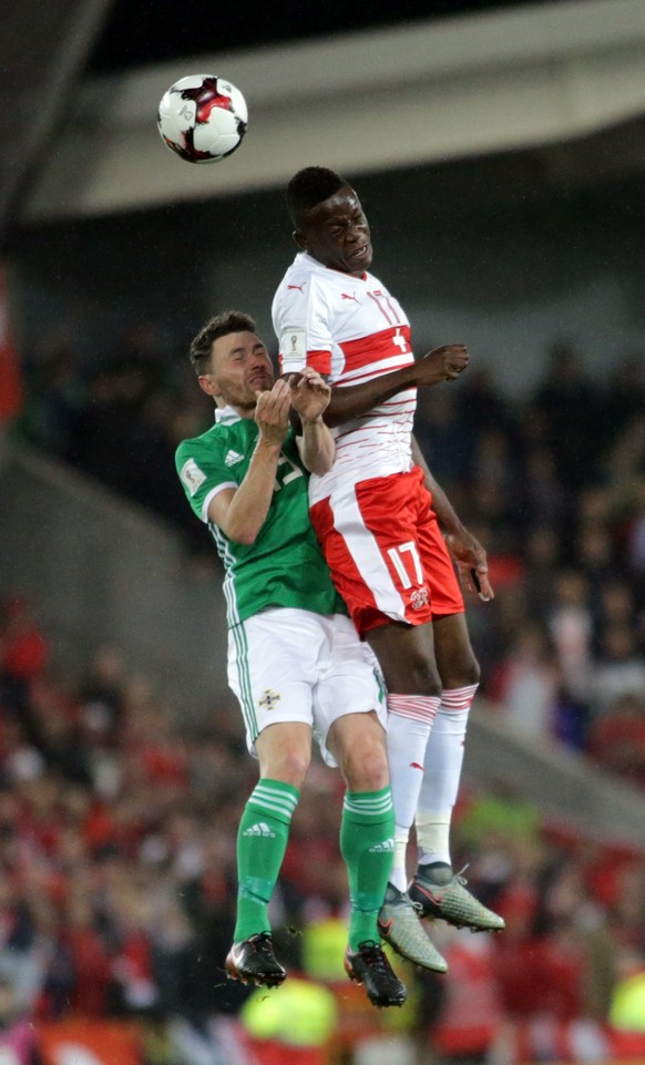 epa06318938 Switzerland&#039;s Denis Zakaria (R) tackles Northern Ireland&#039;s Corry Evans during the 2018 FIFA World Cup play-off first leg soccer match at Windsor Park, in Belfast, Britain, 09 Nov ...