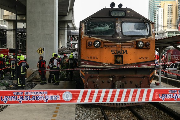 May 16, 2026, Bangkok, Bangkok, Thailand: A train collided with a bus stranded on railway tracks, triggering a fire that engulfed the vehicle, leaving multiple people injured and dead in Bangkok, Thai ...
