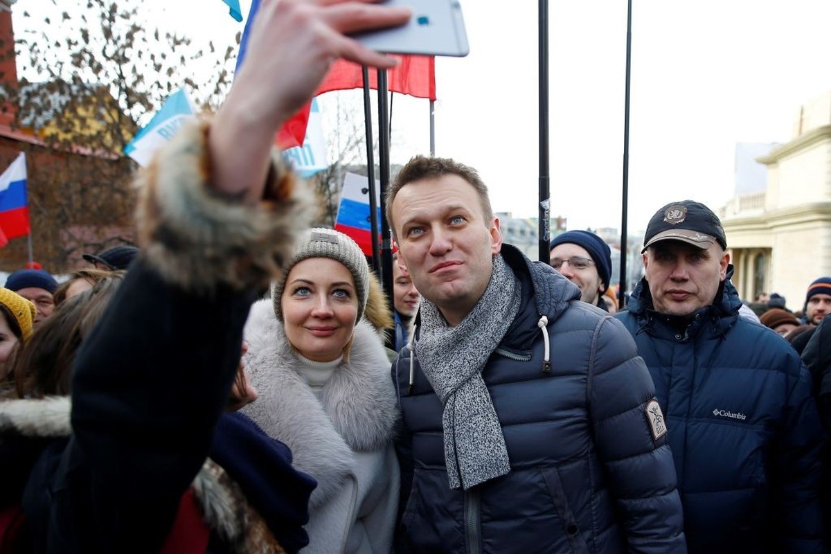 MOSCOW, RUSSIA - FEBRUARY 26: Russian opposition leader Alexei Navalny (2nd R) and his wife Yulia (L) take part in a march in memory of opposition leader Boris Nemtsov in Moscow, Russia, on February 2 ...