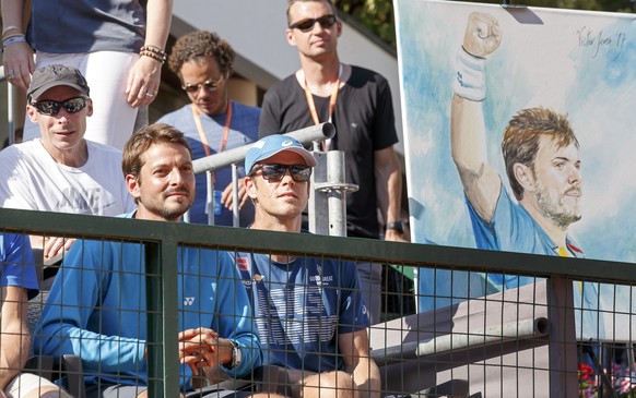 Pierre Paganini, physical coach of Stanislas &quot;Stan&quot; Wawrinka, with Yannick Fattebert, left, and Magnus Norman, right, the two coaches of Stanislas &quot;Stan&quot; Wawrinka, next to a painti ...