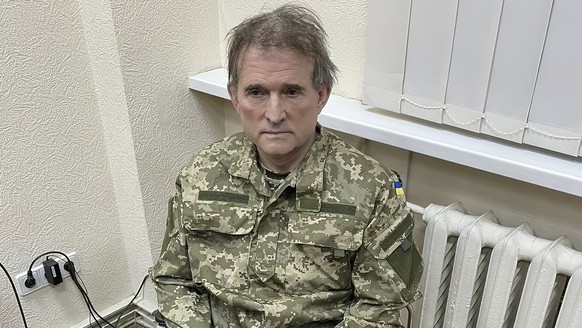 In this image from the Ukrainian Presidential Press Service, oligarch Viktor Medvedchuk, who is both the former leader of a pro-Russian opposition party and a close associate of Russian leader V…