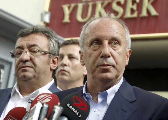 Muharrem Ince, the candidate of Turkey&#039;s main opposition Republican People&#039;s Party, right, speaks to the media outside High Electoral Board in Ankara, Turkey, Sunday, June 24, 2018. The poll ...