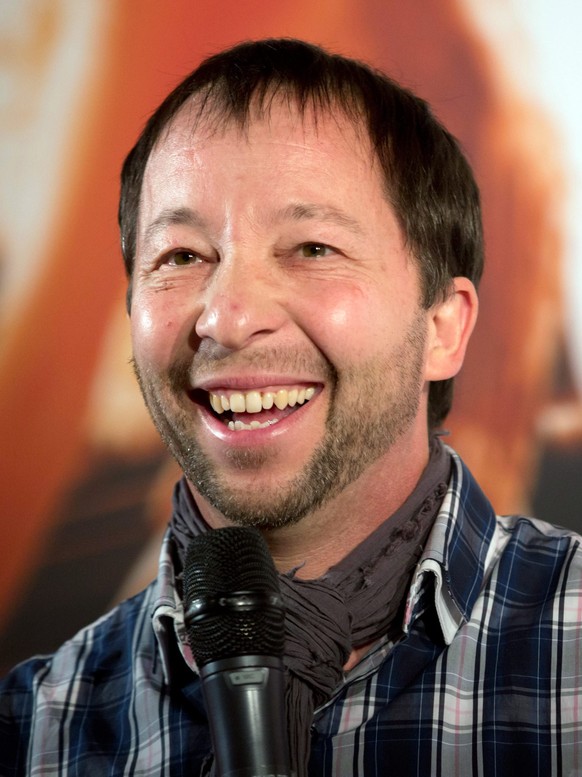 epa04074084 Swiss musician and producer Peter Rene Baumann, aka DJ Bobo, stands in the 'Gibson Club' disco during a press conference for the PRG Live Entertainment Awards (PRG LEA) in Frankf ...