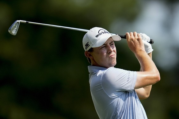 Matt Fitzpatrick hits from the ninth tee during the third round of the Tour Championship golf tournament, Saturday, Aug. 26, 2023, in Atlanta. (AP Photo/Mike Stewart)