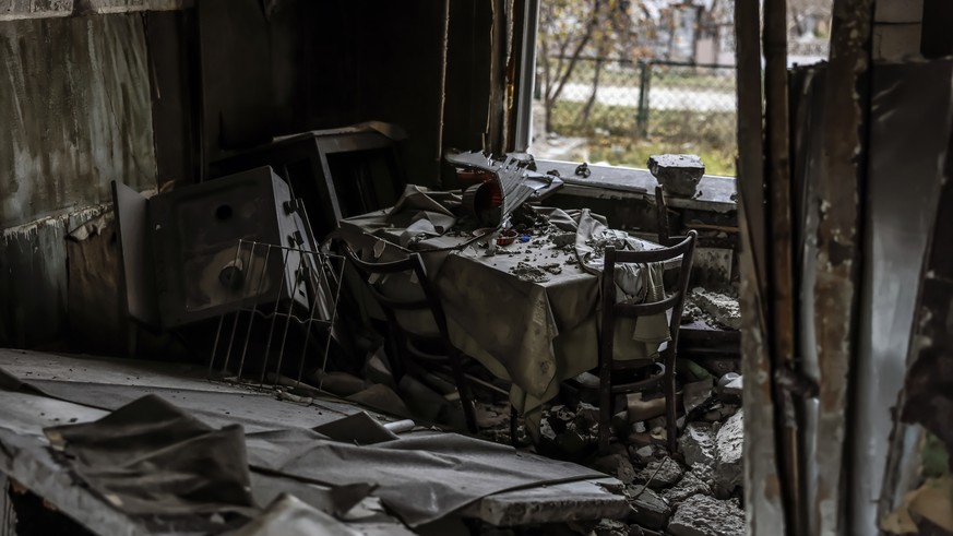 epa10290281 Destruction inside a residential building in Arkhanhelske, in the northern Kherson region, 06 November 2022. The city of Kherson on the Black Sea coast was seized by Russia in the first mo ...