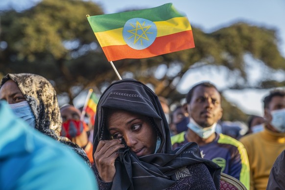 epa09561818 An Ethiopian woman weeps during an event marking the one year anniversary of the war in Tigray, in the capital Addis Ababa, Ethiopia, 03 November 2021. The Tigray Peoples Liberation Front  ...
