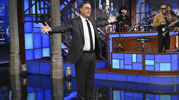 This image released by CBS shows Stephen Colbert during a taping of &quot;The Late Show with Stephen Colbert&quot; on Monday, July 21, 2025, in New York. (Scott Kowalchyk/CBS via AP)
Stephen Colbert