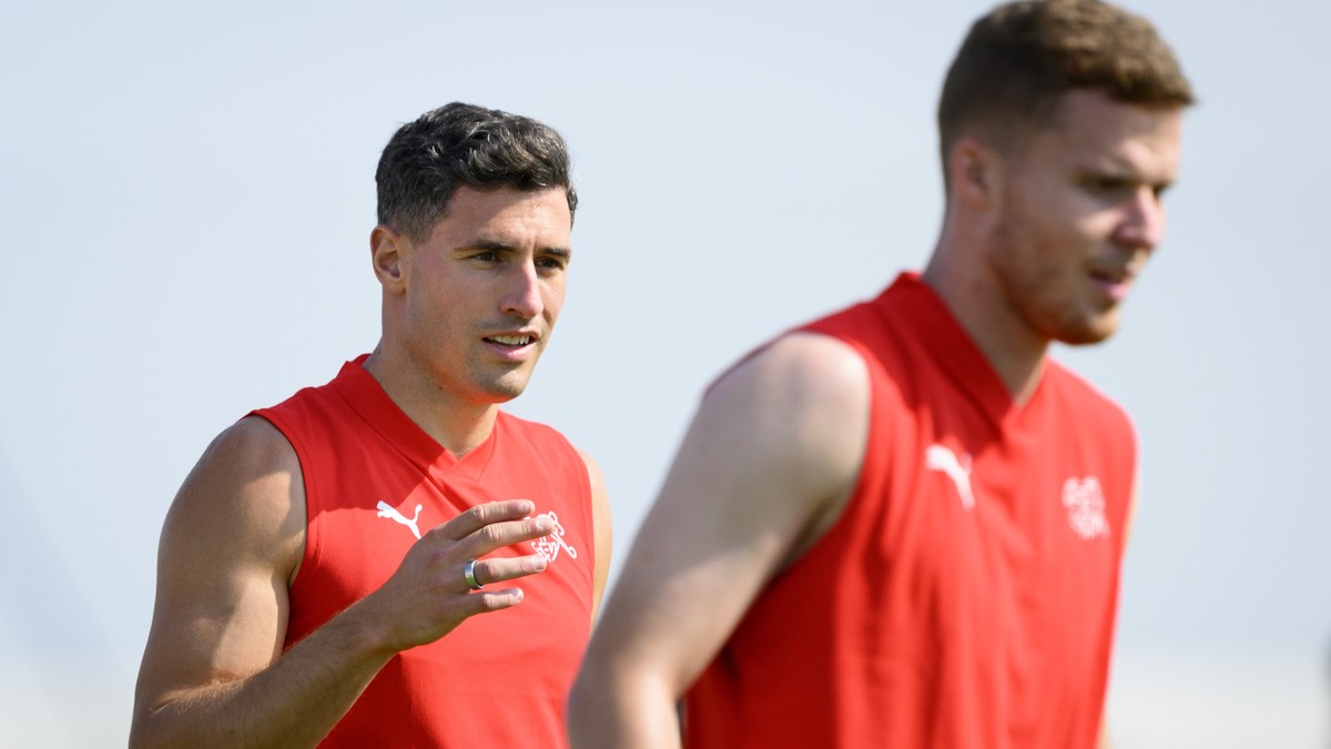 Switzerland's defender Fabian Schaer, left, and Switzerland's defender Nico Elvedi, right, attend a closed training session of Swiss national soccer team on the eve of their FIFA World Cup 2 ...