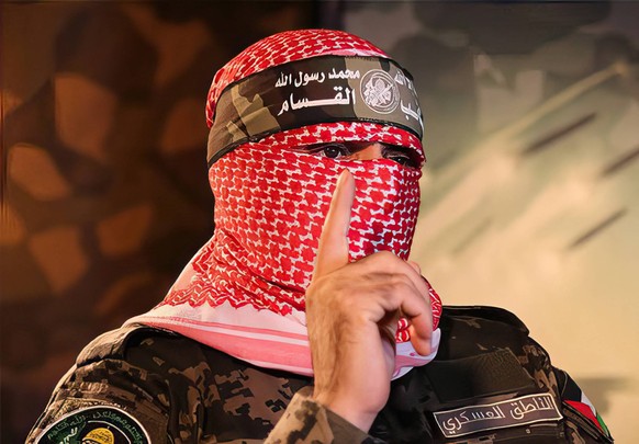 File images of Hamas Al Qassam Brigades - Gaza File photo published by Hamas Islamic Resistance Movement shows Al Qassam Brigades training with various weapons in the Gaza Strip on an unknown day...