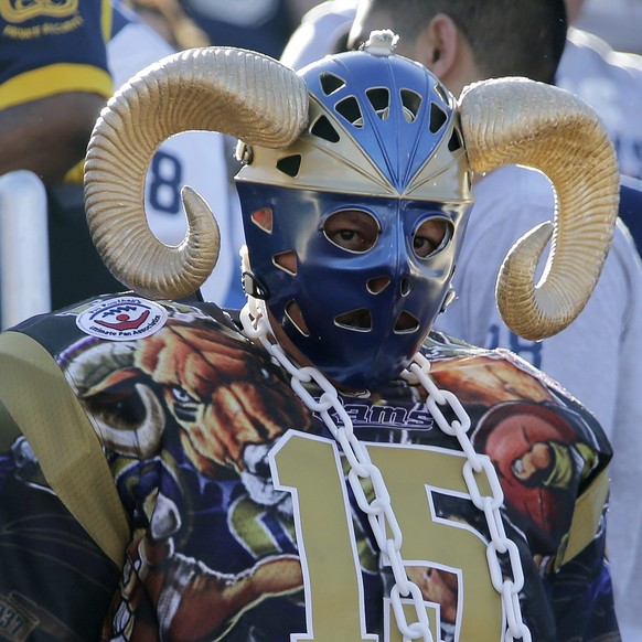 epa05482985 A Los Angeles Rams fan dressed in an elaborate costume attends the pre-season American football game between the Dallas Cowboys and the Los Angeles Rams, at the Los Angeles Memorial Colise ...