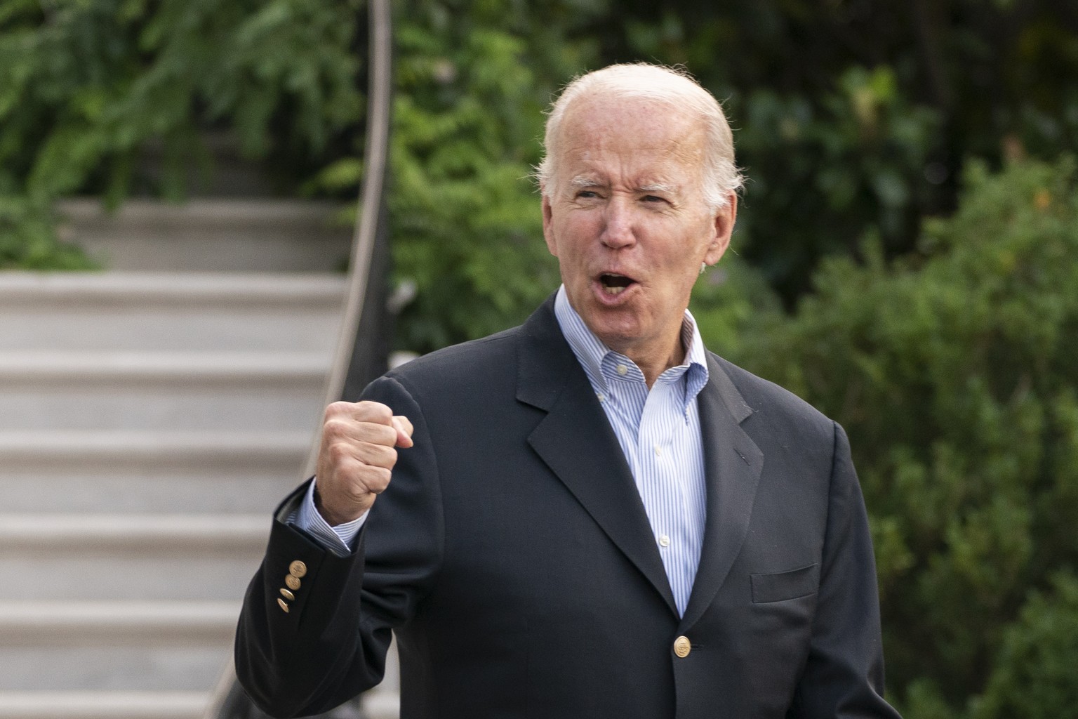 President Joe Biden responds to reporters questions as he walks to board Marine One on the South Lawn of the White House in Washington, on his way to his Rehoboth Beach, Del., home after his most rece ...