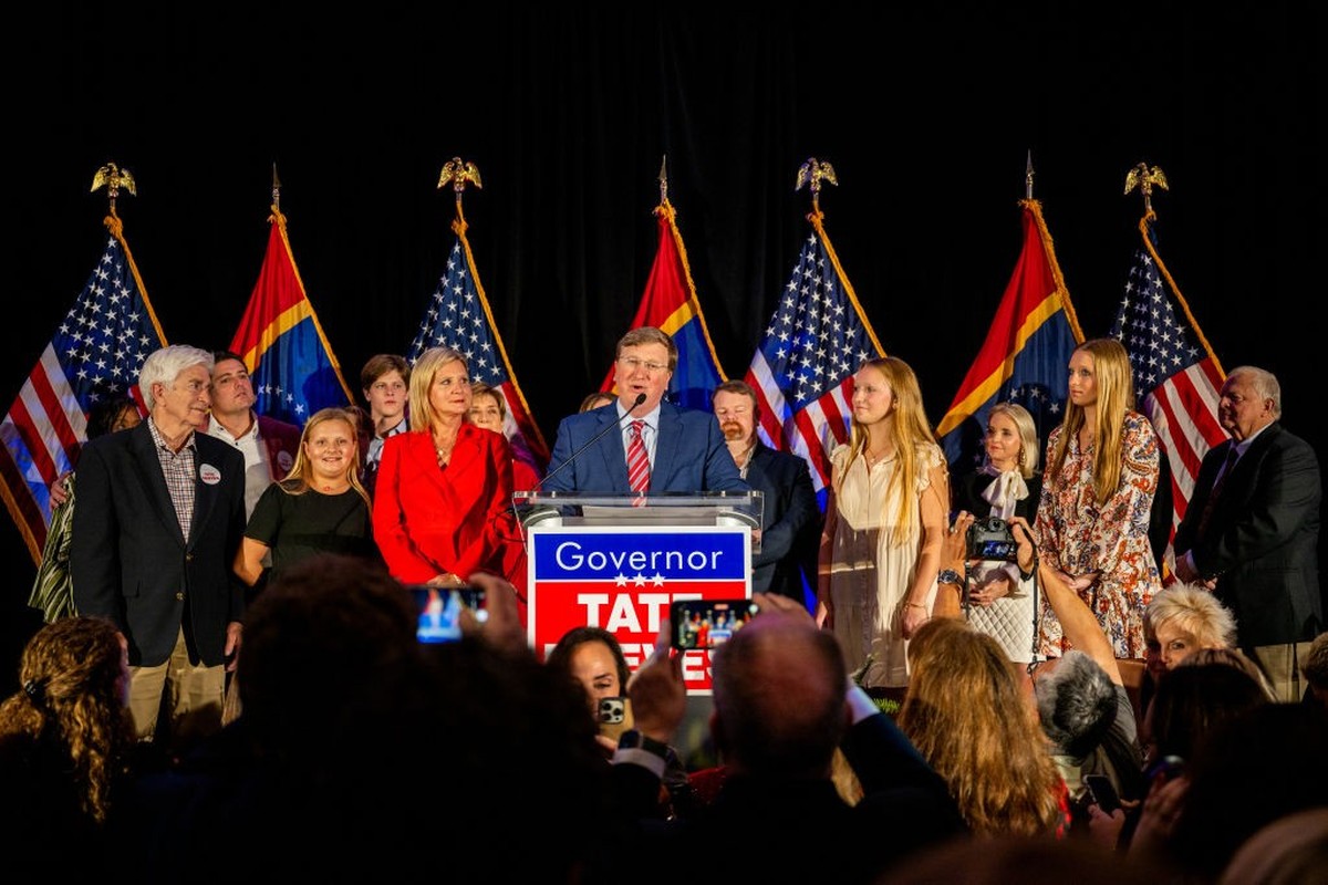 FLOWOOD, MISSISSIPPI - NOVEMBER 07: Mississippi incumbent Republican Gov. Tate Reeves and his family speak to supporters during an election night watch party at The Refuge Hotel &amp; Conference Cente ...
