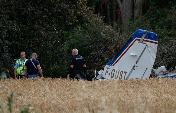 Forensic technicians examine the wreckage of the Cessna 421 piloted by Ubisoft co-founder Claude Guillemot, who was killed when the aircraft crashed while approaching La Baule-Escoublac airfield Frida ...