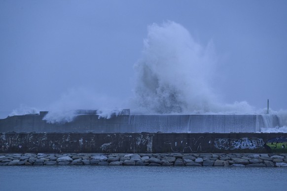 CATANZARO, ITALY - JANUARY 21: A huge wave is seen hitting the harbor’s breakwater after Storm Harry hit the coastal district of Catanzaro Lido, Italy in the early hours, causing waves exceeding five  ...