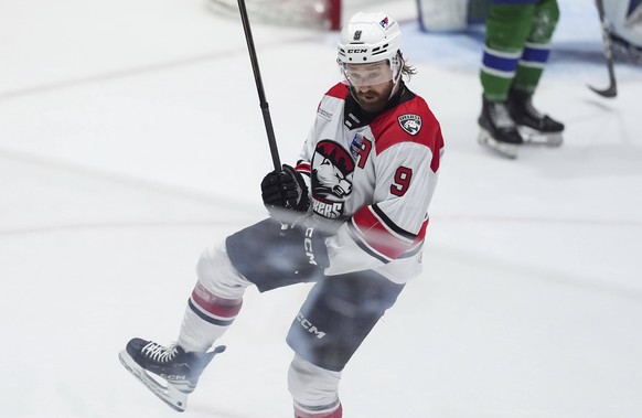 Charlotte Checkers&#039; Rasmus Asplund celebrates after his goal against the Abbotsford Canucks during the second period in Game 5 of the AHL hockey Calder Cup Final in Abbotsford, British Columbia,  ...