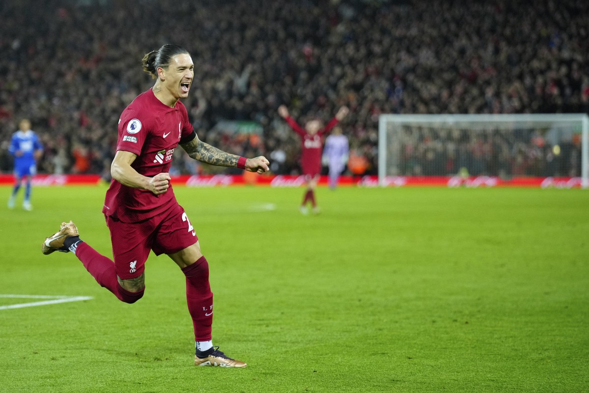 Liverpool's Darwin Nunez celebrates after Leicester's Wout Faes scores an own goal past his goalkeeper during the English Premier League soccer match between Liverpool and Leicester City at  ...