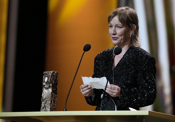 Sandra H�ller speaks as she was awarded with the Best Actress Cesar Award for the movie &quot;Anatomie d&#039;une chute,&quot; during the 49th Cesar Awards ceremony in Paris, Friday, Feb. 23, 2024. (A ...