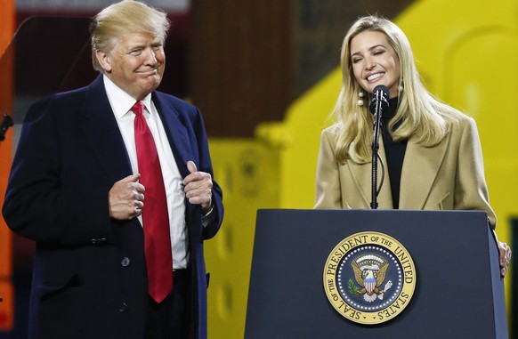 President Donald Trump, left, stands beside his daughter Ivanka Trump as she makes remarks at H&amp;K Equipment Company on Thursday, Jan. 18, 2018 in Coraopolis, Pa.(AP Photo/Keith Srakocic)