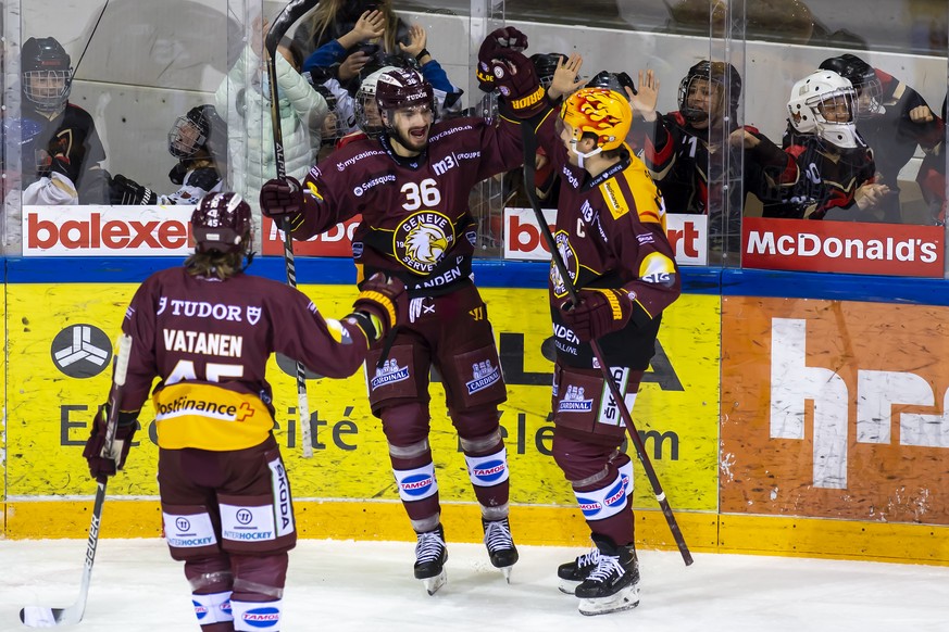 Le defenseur genevois Sami Vatanen, l?attaquant genevois Arnaud Riat, le top scorer PostFinance genevois Henrik Toemmernes, de gauche a droite, laissent eclater leur joie, lors du match du championnat ...