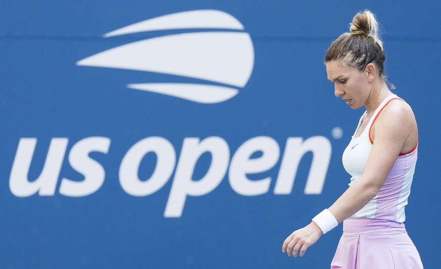 epa10146072 Simona Halep of Romania during her first round loss to Daria Snigur of Ukraine at the US Open Tennis Championships at the USTA National Tennis Center in the Flushing Meadows, New York, USA ...