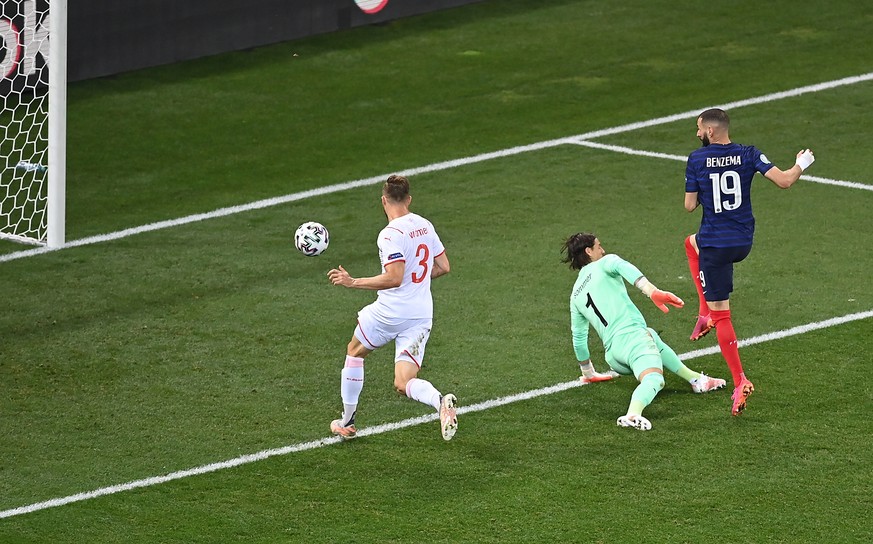 epa09309405 Karim Benzema (R) of France scores his team's first goal during the UEFA EURO 2020 round of 16 soccer match between France and Switzerland in Bucharest, Romania, 28 June 2021. EPA/Dan ...