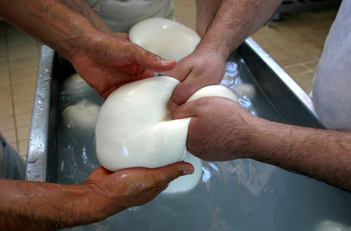 FILE - Buffalo mozzarella cheese is prepared at a dairy in Caserta, near Naples, southern Italy, 2006. (AP Photo/Franco Castano', File)
Italy-Mozzarella-Protest