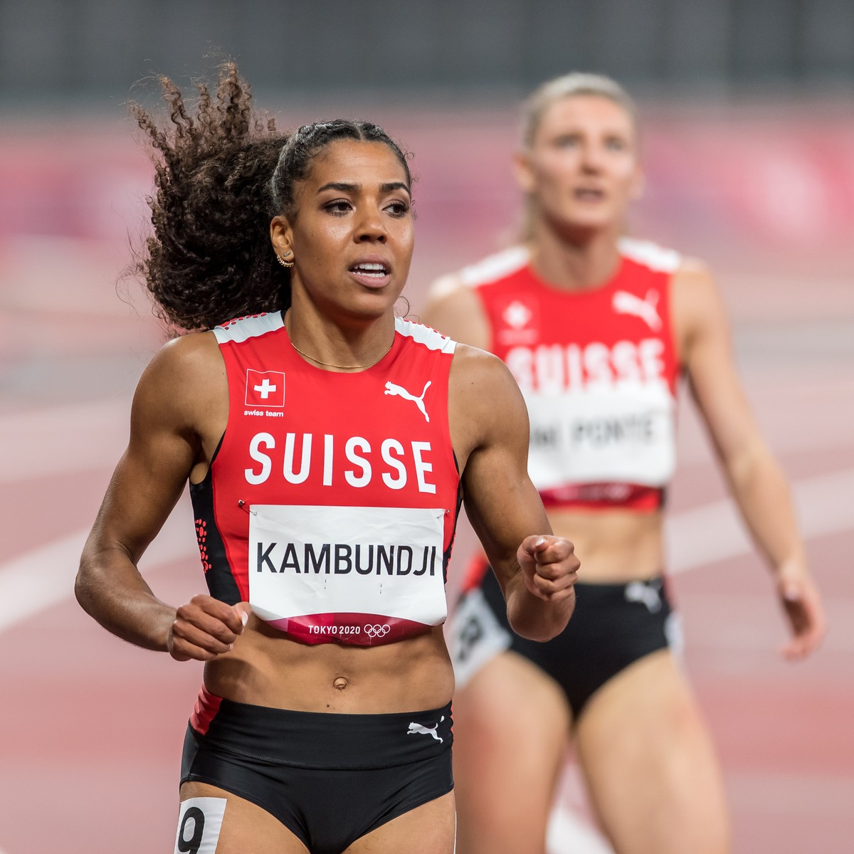 Mujinga Kambundji of Switzerland finishes the final of the women's 100 m race in rank six at the 2020 Tokyo Summer Olympics Games in Tokyo, Japan, on Saturday, July 31, 2021. (KEYSTONE/ATHLETIX.C ...