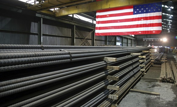 FILE - In this May 9, 2019, file photo, steel rods produced at the Gerdau Ameristeel mill in St. Paul, Minn., await shipment. In a deal announced Tuesday, March 22, 2022, the United States has agreed  ...