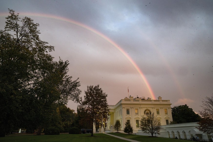 Rainbows are seen over the White House, Tuesday, Oct. 22, 2019, in Washington, after a cold front moved through the region. (AP Photo/Alex Brandon)