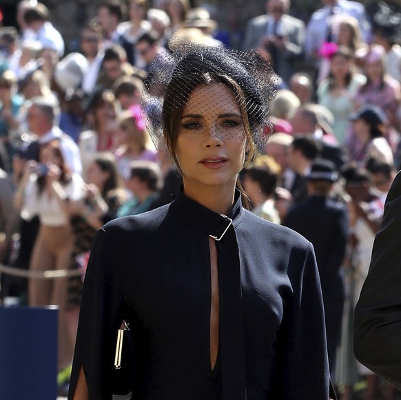 David and Victoria Beckham arrive for the wedding ceremony of Prince Harry and Meghan Markle at St. George&#039;s Chapel in Windsor Castle in Windsor, near London, England, Saturday, May 19, 2018. (Ch ...