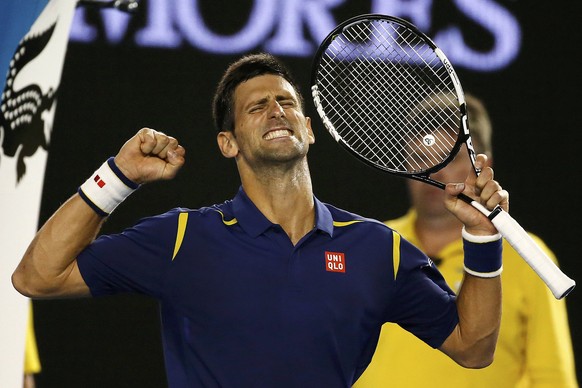 Serbia&#039;s Novak Djokovic celebrates after winning his semi-final match against Switzerland&#039;s Roger Federer at the Australian Open tennis tournament at Melbourne Park, Australia, January 28, 2 ...