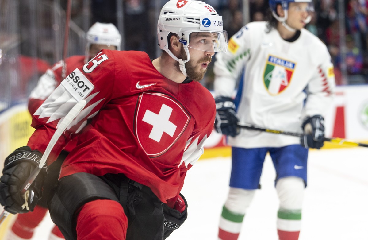 epa07562041 Switzerland's Lino Martschini celebrates after scoring the 3-0 during the IIHF 2019 World Ice Hockey Championships group B match between Switzerland and Italy at the Ondrej Nepela Are ...