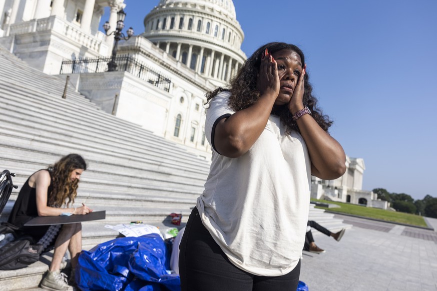 epa09388296 Democratic Representative from Missouri Cori Bush continues her protest for an extension of the eviction moratorium outside the US Capitol in Washington, DC, USA, 02 August, 2021. Bush has ...