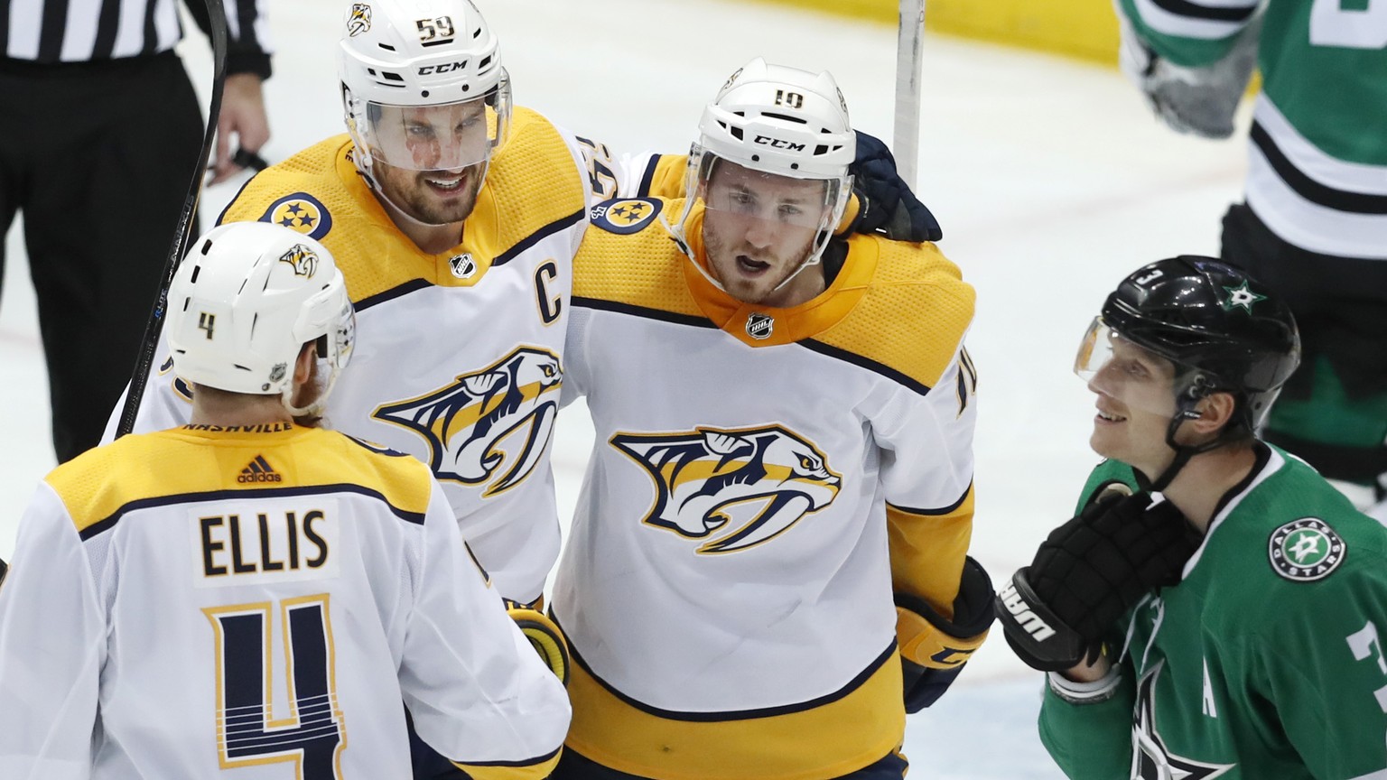 Nashville Predators defenseman Roman Josi (59) celebrates his goal with teammates Ryan Ellis (4) and Colton Sissons (10) as Dallas Stars defenseman John Klingberg (3) skates nearby during the third pe ...