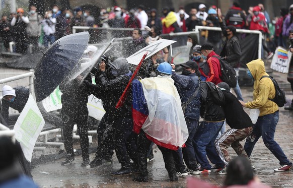 Anti-government protesters clash with police in Bogota, Colombia, Wednesday, May 5, 2021. The protests that began last week over a tax reform proposal continue despite President Ivan Duque&#039;s with ...