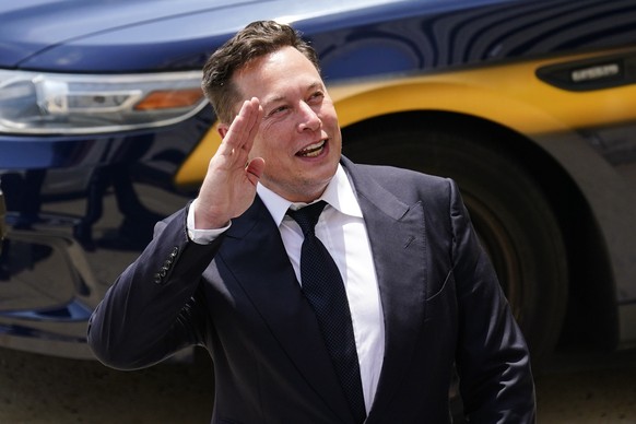 FILE - Tesla CEO Elon Musk departs from the justice center in Wilmington, Del., Tuesday, July 13, 2021. Democrats are hoping to raise revenue for their legislative agenda by taxing the assets of billi ...