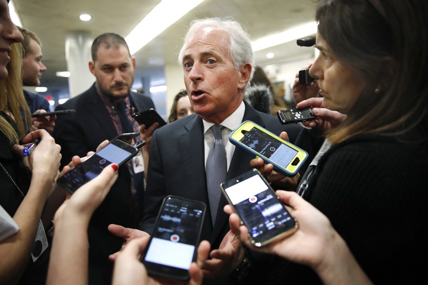 Sen. Bob Corker, R-Tenn., speaks to reporters while heading to vote on budget amendments, Thursday, Oct. 19, 2017, in Washington. (AP Photo/Jacquelyn Martin)