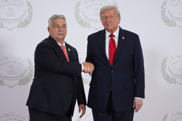 President Donald Trump greets Hungary&#039;s Prime Minister Viktor Orban during a summit to support ending the more than two-year Israel-Hamas war in Gaza after a breakthrough ceasefire deal, Monday,  ...