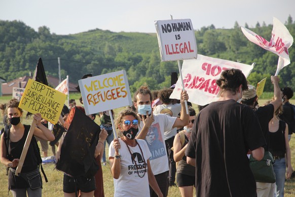 People take part in a protest against the violent pushbacks of migrants, allegedly conducted by Croatian police, near the border crossing between Croatia and Bosnia Herzegovina in Maljevac, Croatia, S ...