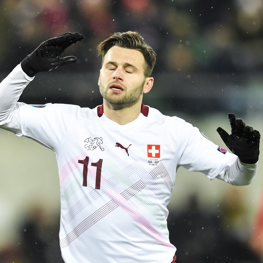 Switzerland&#039;s midfielder Renato Steffen reacts after a missed chance during the UEFA Euro 2020 qualifying Group D soccer match between Switzerland and Georgia at the Kybunpark stadium in St. Gall ...