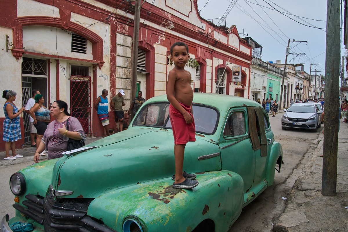 A child plays on top of a deteriorated classic American car in Regla, Cuba, Monday, Sept. 7, 2026. (AP Photo/Ramon Espinosa)
APTOPIX Cuba Daily Life