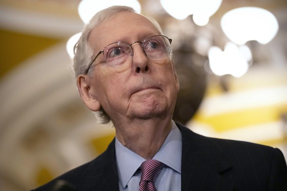 FILE - Senate Minority Leader Mitch McConnell of Ky., listens to a reporter&#039;s question during a press availability on Capitol Hill, Feb. 27, 2024, in Washington. McConnell says he&#039;ll step do ...