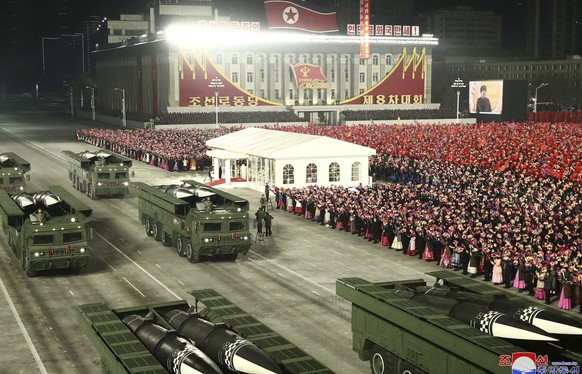 In this photo provided by the North Korean government, missiles are seen on truck a military parade marking the ruling party congress, at Kim Il Sung Square in Pyongyang, North Korea Thursday, Jan. 14 ...