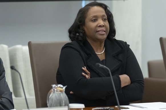 FILE - Federal Reserve Board of Governors member Lisa Cook listens during an open meeting of the Board of Governors at the Federal Reserve, June 25, 2025, in Washington. (AP Photo/Mark Schiefelbein, F ...
