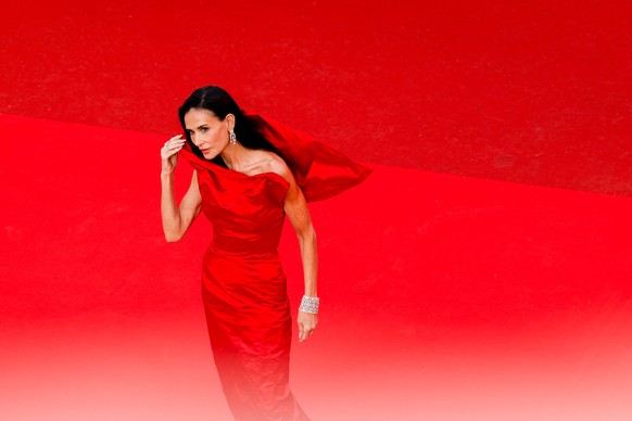 epaselect epa12957672 Feature Films Jury member Demi Moore attends the premiere of 'Fatherland' during the 79th annual Cannes Film Festival, in Cannes, France, 14 May 2026. The film festival ...