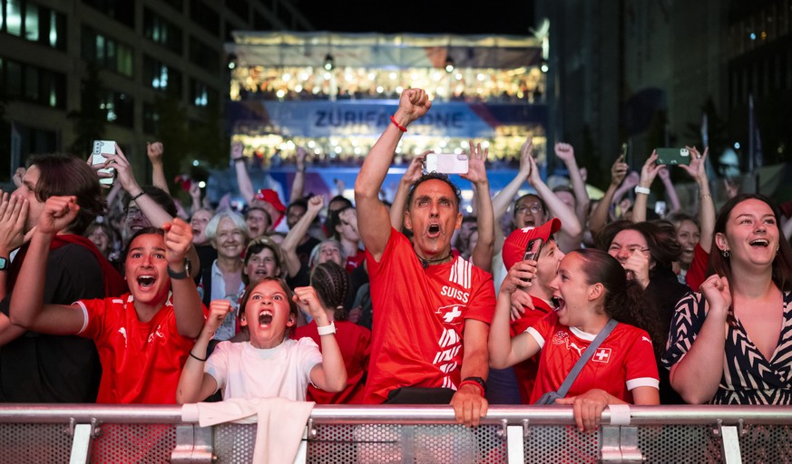 Swiss soccer fans reacts during the live broadcast of the UEFA Women&#039;s EURO 2025 soccer match between Finland and Switzerland at the ZueriFanzone Europaallee in Zurich, Switzerland, Thursday, 10. ...