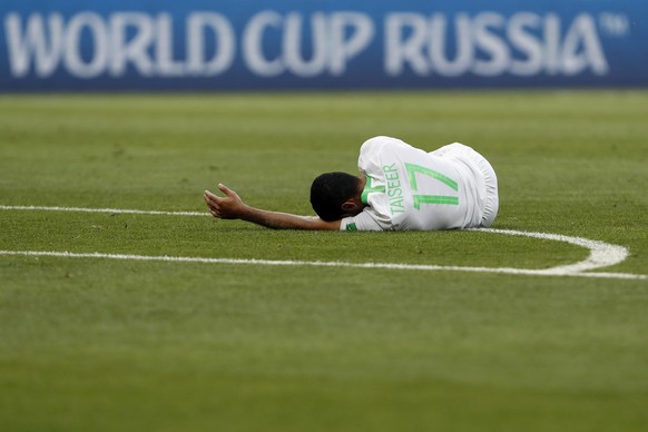 Saudi Arabia&#039;s Taiseer Aljassam lies on the pitch during for the group A match between Uruguay and Saudi Arabia at the 2018 soccer World Cup in Rostov Arena in Rostov-on-Don, Russia, Wednesday, J ...