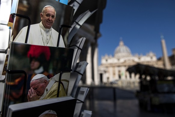 epa09323414 Photos of Pope Francis are seen at St. Peter&#039;s Square the day after Pope Francis underwent a scheduled surgery for symptomatic diverticular stenosis of the colon at the Agostino Gemel ...